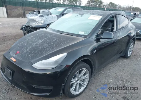 2023 Tesla Model Y Awd/Long Range Dual Motor All-Wheel Drive z USA, uszkodzony, nr VIN 7SAYGDEE3PA180998